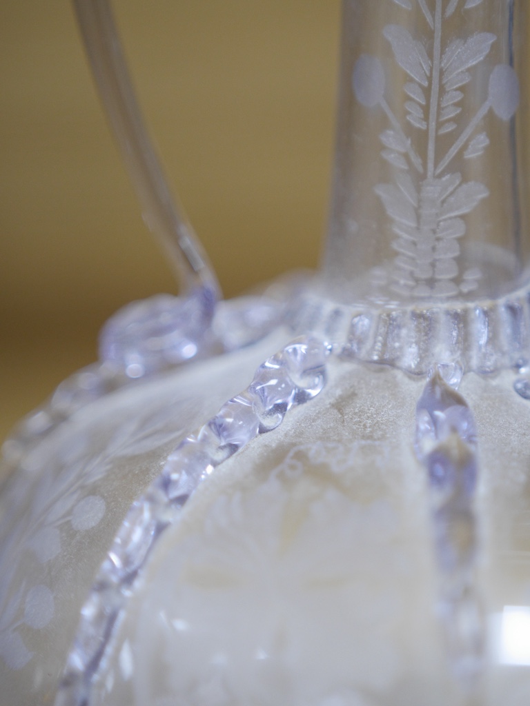 A pair of 18th century wheel engraved Dutch two handled glass decanters, 23cm high. Condition - good